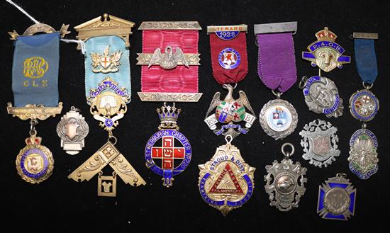 A collection of silver Masonic and other breast jewels, badges and watch fobs and an R.A.O.B. pin